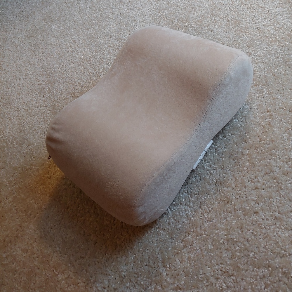 Serta Brand new tan/cream colored neck pillow